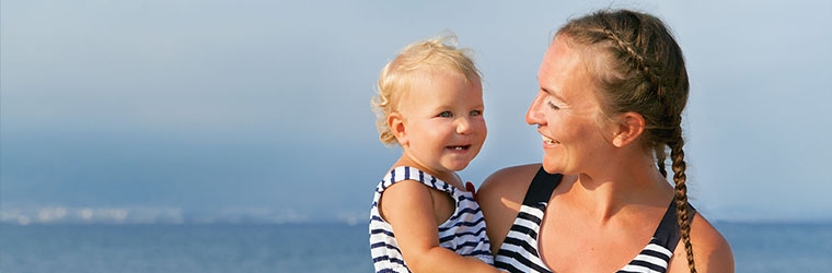 Mother and child on the beach