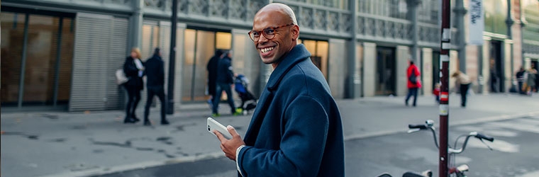 Business man crossing the street