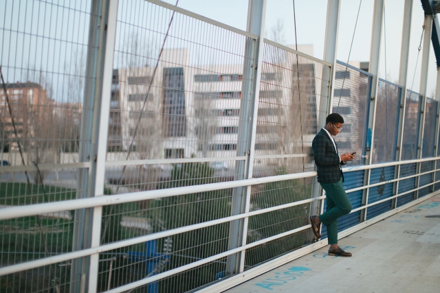 Businessman on bridge