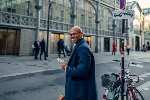 Business man crossing the street