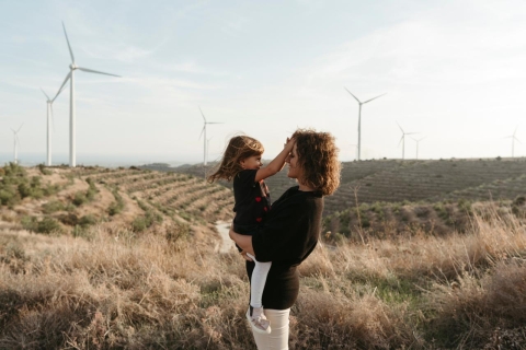 Mother and child with wind turbines